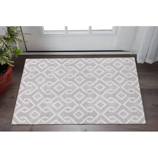 Lavender And Ivory Geometric Washable Area Rug With UV Protection Photo 2