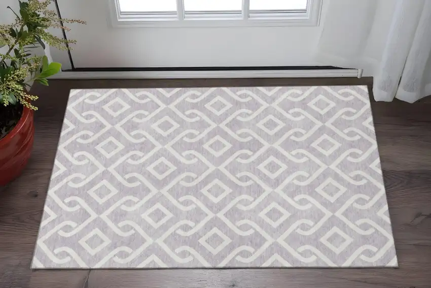 Lavender And Ivory Geometric Washable Area Rug With UV Protection Photo 2