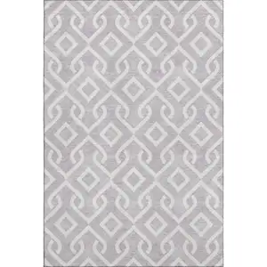 Photo of Lavender And Ivory Geometric Washable Area Rug With UV Protection