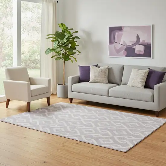 Lavender And Ivory Geometric Washable Area Rug With UV Protection Photo 1