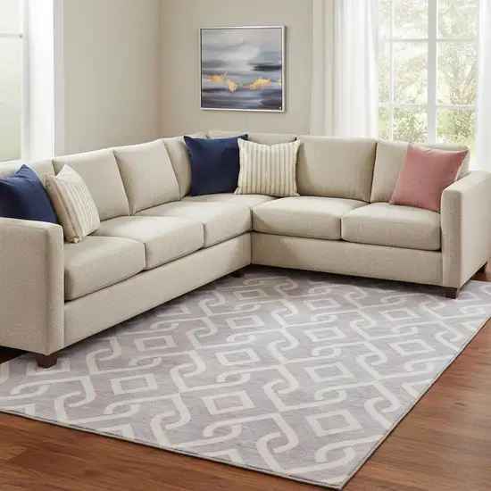 Lavender And Ivory Geometric Washable Area Rug With UV Protection Photo 1