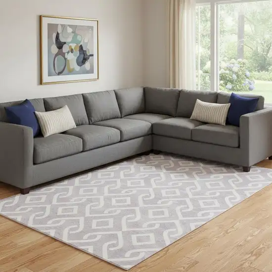 Lavender And Ivory Geometric Washable Area Rug With UV Protection Photo 1