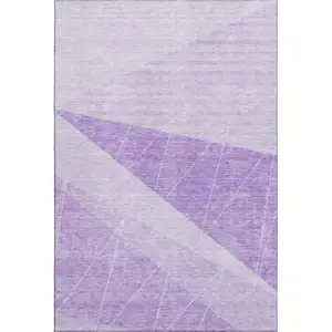 Photo of Lavender And Ivory Geometric Washable Area Rug With UV Protection