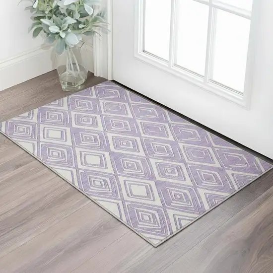 Lavender And Ivory Geometric Washable Area Rug With UV Protection Photo 1