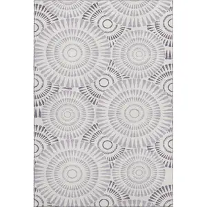 Photo of Lavender And Ivory Geometric Washable Area Rug With UV Protection
