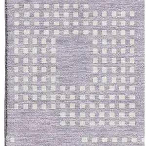 Photo of Lavender And Ivory Geometric Washable Area Rug With UV Protection