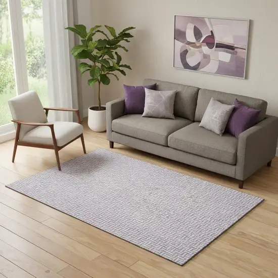 Lavender And Ivory Geometric Washable Area Rug With UV Protection Photo 1