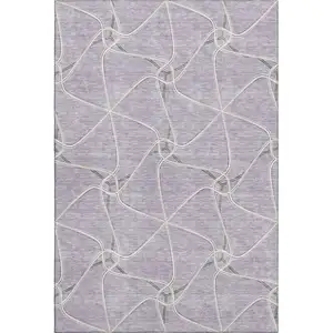 Photo of Lavender And Ivory Geometric Washable Area Rug With UV Protection
