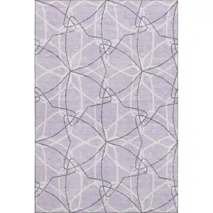 Photo of Lavender And Ivory Geometric Washable Area Rug With UV Protection