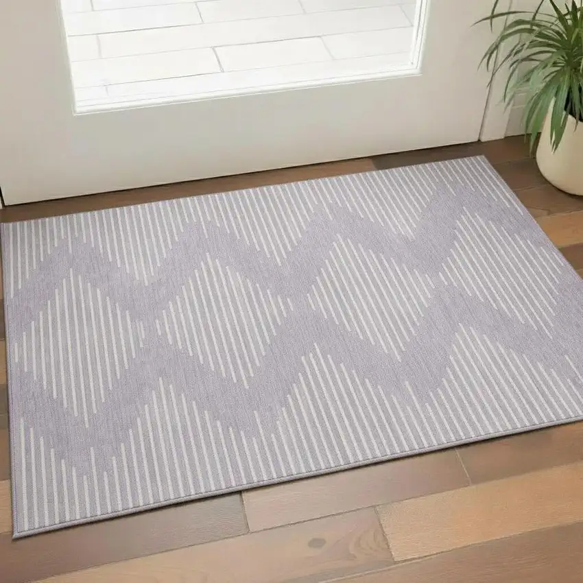 Lavender And Ivory Geometric Washable Area Rug With UV Protection Photo 2