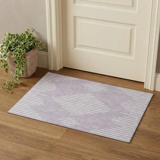 Lavender And Ivory Geometric Washable Area Rug With UV Protection Photo 1