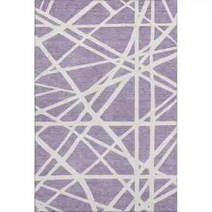 Photo of Lavender And Ivory Geometric Washable Area Rug With UV Protection