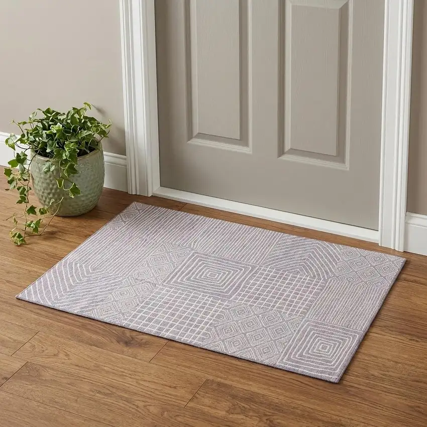 Lavender And Ivory Geometric Washable Area Rug With UV Protection Photo 1