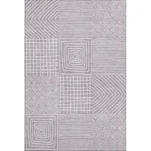 Photo of Lavender And Ivory Geometric Washable Area Rug With UV Protection