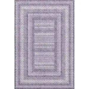 Photo of Lavender And Ivory Geometric Washable Area Rug With UV Protection