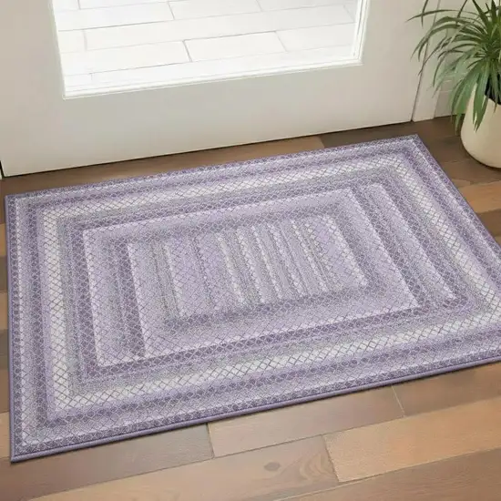 Lavender And Ivory Geometric Washable Area Rug With UV Protection Photo 1