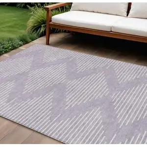Photo of Lavender And Ivory Geometric Washable Indoor Outdoor Area Rug