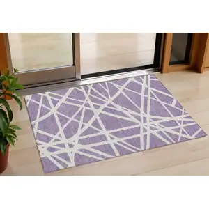 Photo of Lavender And Ivory Geometric Washable Indoor Outdoor Area Rug