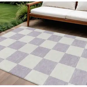 Photo of Lavender And Ivory Geometric Washable Indoor Outdoor Area Rug