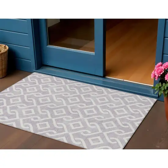 Lavender And Ivory Geometric Washable Indoor Outdoor Area Rug Photo 1