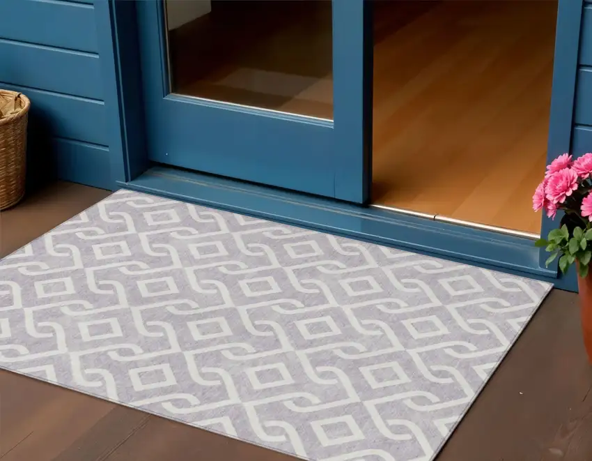 Lavender And Ivory Geometric Washable Indoor Outdoor Area Rug Photo 1