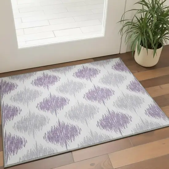 Lavender And Ivory Ikat Washable Area Rug With UV Protection Photo 2