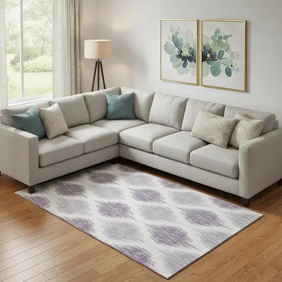 Lavender And Ivory Ikat Washable Area Rug With UV Protection Photo 1