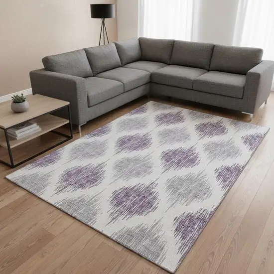 Lavender And Ivory Ikat Washable Area Rug With UV Protection Photo 2