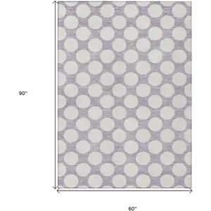 Photo of Lavender And Ivory Polka Dot Washable Indoor Outdoor Area Rug