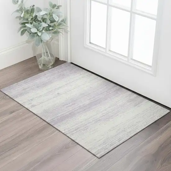 Lavender And Ivory Striped Washable Area Rug With UV Protection Photo 1