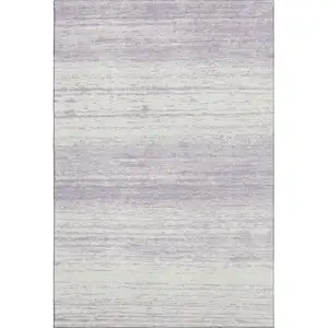 Photo of Lavender And Ivory Striped Washable Area Rug With UV Protection