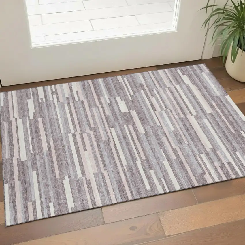 Lavender And Ivory Striped Washable Area Rug With UV Protection Photo 1