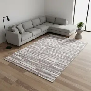 Photo of Lavender And Ivory Striped Washable Area Rug With UV Protection