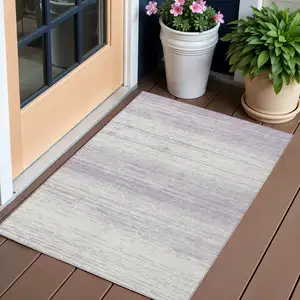 Photo of Lavender And Ivory Striped Washable Indoor Outdoor Area Rug