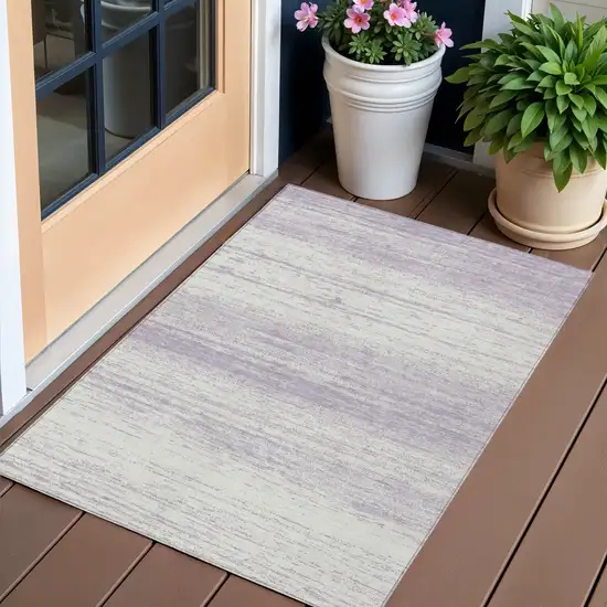 Lavender And Ivory Striped Washable Indoor Outdoor Area Rug Photo 1