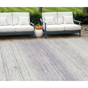 Photo of Lavender And Ivory Striped Washable Indoor Outdoor Area Rug