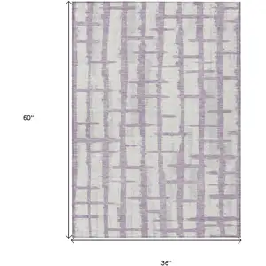 Photo of Lavender And Ivory Striped Washable Indoor Outdoor Area Rug