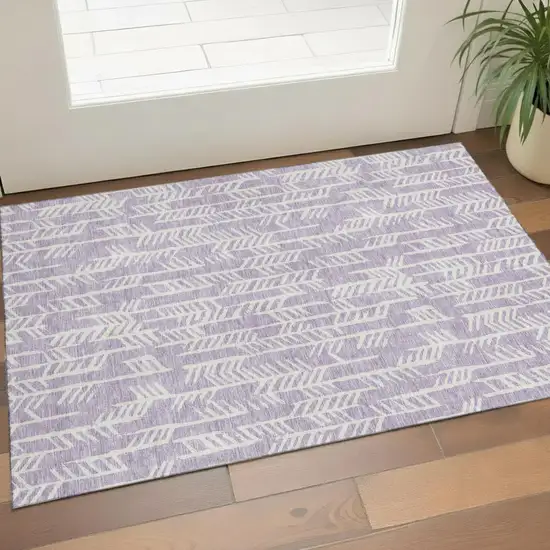Lavender And Ivory Tribal Washable Area Rug With UV Protection Photo 1