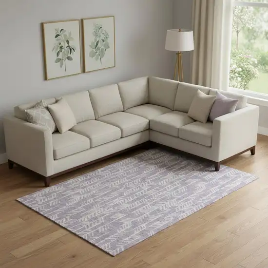 Lavender And Ivory Tribal Washable Area Rug With UV Protection Photo 1