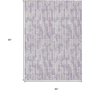 Photo of Lavender And Ivory Tribal Washable Indoor Outdoor Area Rug
