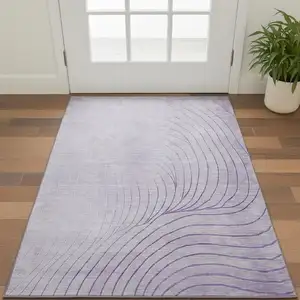 Photo of Lavender And Silver Abstract Washable Area Rug With UV Protection
