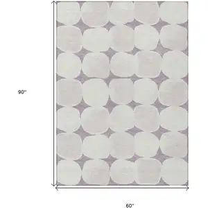 Photo of Lavender Beige And Ivory Abstract Washable Indoor Outdoor Area Rug