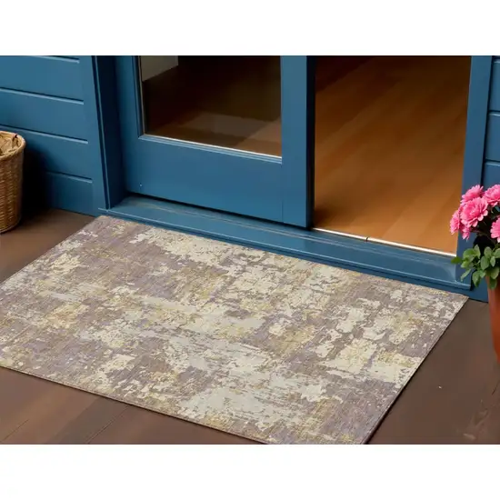 Lavender Gold And Beige Abstract Washable Indoor Outdoor Area Rug Photo 1
