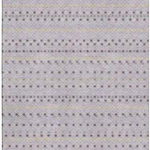 Photo of Lavender Gold And Gray Striped Washable Area Rug With UV Protection