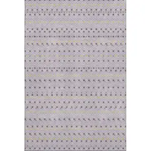 Photo of Lavender Gold And Gray Striped Washable Area Rug With UV Protection