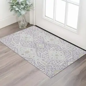 Photo of Lavender Gray And Beige Floral Washable Area Rug With UV Protection