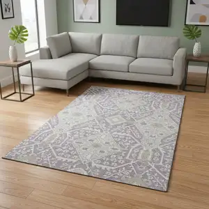 Photo of Lavender Gray And Beige Floral Washable Area Rug With UV Protection