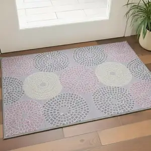 Photo of Lavender Gray And Blush Geometric Washable Area Rug With UV Protection