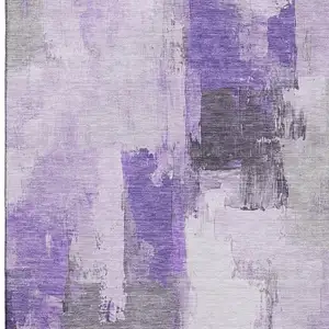 Photo of Lavender Gray And Ivory Abstract Washable Area Rug With UV Protection
