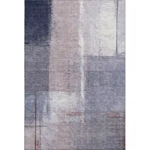 Photo of Lavender Gray And Ivory Abstract Washable Area Rug With UV Protection